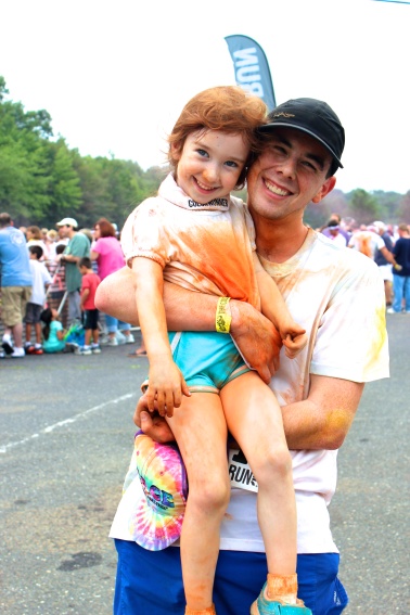 After running her first 5K with her dad